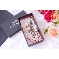 Charm chạm đeo túi và móc khóa Coach bướm