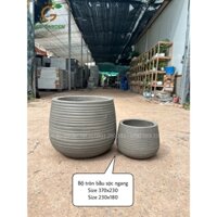 Chậu xi măng đá mài trồng cây dáng tròn bầu sọc ngang