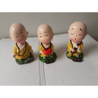 chú tiểu đầu trọc tịnh tâm lò xo nhúng