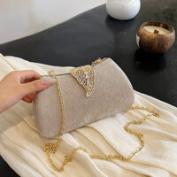 Clutch nữ túi cầm tay dự tiệc nắp cài chiếc lá cuốn bay BAG U CLE23