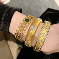 Cô dâu Retro Ý Seiko vẽ thủ công mạ vàng ren rỗng đính đá Zircon Vòng tay rộng