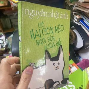 Có hai con mèo ngồi bên cửa sổ - Nguyễn Nhật Ánh