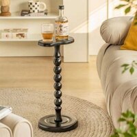 Cốc gỗ thật, mấy cái ghế sofa mini, mấy đầu giường, góc bàn nhỏ, mấy cái kệ gỗ đen.