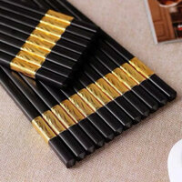 Combo 100 đôi đũa nhựa đen mạ vàng chống trơn trượt chịu nhiệt cao sử dụng cho nhà hàng quán sang trọng