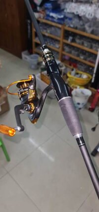 COMBO cần lure Plug-in 1.8m và máy câu JK-2000