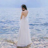 Đầm maxi trắng cổ yếm xẻ tà