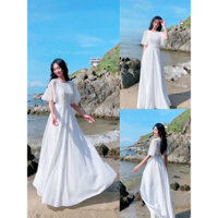 đầm maxi trắng dài tay loe cổ tròn kín đáo