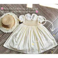 Đầm SMOCK(Hàng Cao Cấp) màu kem ,cổ sen tay búp ,ở phần ngực,cổ ,tay áo được xích móc thủ côg bằng tay rất tỉ mỉ sắc nét