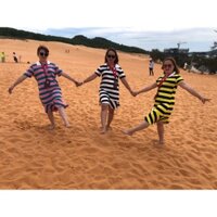 Đầm sọc ngang đen vàng.