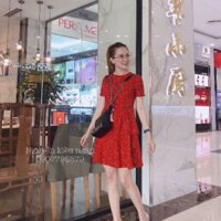 Đầm tùng xòe lụa tay con chấm bi cự xinh