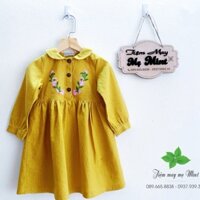 Đầm vàng cổ sen thêu hoa