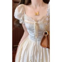 ĐẦM XÔ THÊU HOA TRẮNG NỔI VIỀN REN NGỰC 3 NƠ TUTA DRESS
