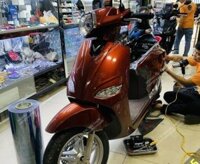 Dán keo xe máy điện Vinfast Vento