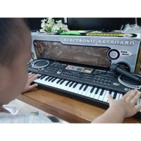 Đàn Piano điện tử 61 phím bấm kèm micro cho Bé