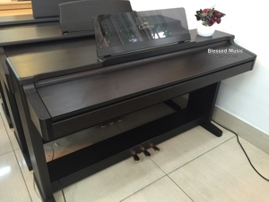 Đàn piano Yamaha CLP-124