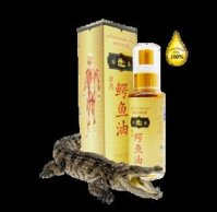 Dầu massage cá sấu vàng Herbal Massage Oil Crocodile Brand