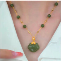 Dây chuyền nữ. Titan mạ vàng 18k, không đen, không dị ứng , tắm rửa thoả mái . Đính đá mã não màu xanh rất sang và đẹp.