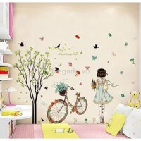 DECAL DÁN TƯỜNG CÂY XANH VÀ CÔ GÁI XE ĐẠP