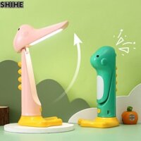 Đèn bàn sạc USB khủng long dễ thương có giá đỡ điện thoại cho trẻ em