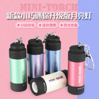 Đèn pin mini LED siêu sáng xuyên biên giới, đèn chìa khóa mini, sạc USB, đèn pin nhỏ sơn ngọc trai kéo dài