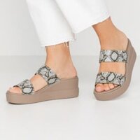 DÉP ĐẾ XUỒNG CROCS BLOOKLYN MID WEDGE CHO  NỮ  HỌA TIẾT DA RẮN