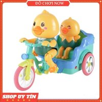 Đồ chơi vịt đạp xe có đàn nhạc vui nhộn bánh xe phát sáng - vịt chạy xe nhựa an toàn cho bé