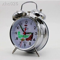 đồng hồ báo thức lên dây cót,gà mổ thóc,chạy hoàn toàn bằng cơ