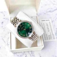 Đồng Hồ Nữ Anne Klein AK/2230GNGB mặt xanh ngọc lục viền đá (size 34mm)