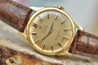 Đồng hồ Omega Constellation bát úp cọc đá đen vàng 18k