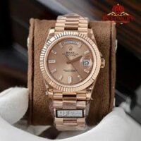 Đồng Hồ Rolex Day-Date 228235 Vàng Hồng Mặt Sundust Cọc Số Đá Baguette Replica 1:1 QF 40mm