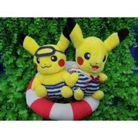 Gấu bông cặp pikachu bơi phao tắm biển