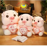 Gấu bông lợn hồng ôm trái tim cute, ngộ nghĩnh đáng yêu – Gấu bông hình con heo - Timibedding