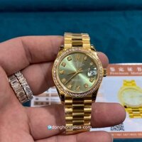 Giá đồng hồ Rolex nữ mặt xanh Green Datejust viền đá bọc vàng
