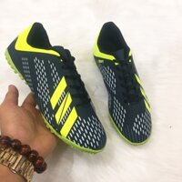 giày bóng đá màu xanh đen sọc xanh lá cây may đế :)) :))