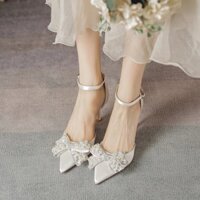 Giày cao gót 7p nơ đá khoét eo mũi nhọn nơ ngọc đá trắng lấp lánh Hàng chuẩn QCCC (fullbox hãng)