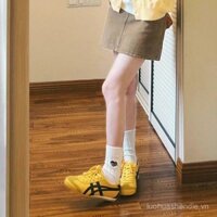 Giày đơn phối màu mẫu mới mùa thu nữ cổ điển Giày trượt ván thường ngày đế bằng Dễ phối thể thao màu vàng