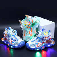 Giày trẻ em Ultraman mùa hè mới, dép sandal kín mũi phát sáng cho bé trai, giày bãi biển cho trẻ nhỏ, kiểu khóa xoay