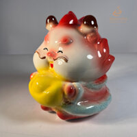 Heo tiết kiệm, Ống tiết kiệm mèo tài lộc ôm đĩnh vàng để ban thần tài, bàn làm việc thu hút may mắn