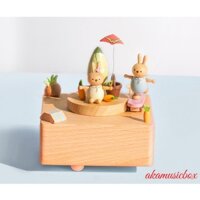 Hộp âm nhạc bằng gỗ xoay tròn hoạt động bằng cách lên dây cót họa tiết con vật dễ thương hình thỏ