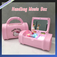 Hộp Nhạc Hello Kitty Cầm Tay Xoay Vòng Sáng Tạo Nhiều Màu Sắc Cho Bé