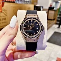 Hublot Geneve |Nữ Giới |Rose Gold |Đính Đá Đen |Dây Silicone |Máy Pin (Máy Quartz) |Size 34mm