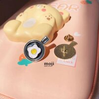 Huy hiệu pin Chảo ốp la
