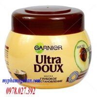 Kem ủ tóc Garnier Ultra Doux tính chất bơ giúp tóc mềm mượt