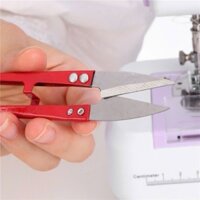 Kéo kim loại cắt chỉ thừa