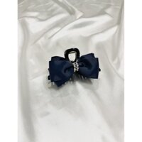 Kẹp càng cua dọc nơ xanh sang trọng