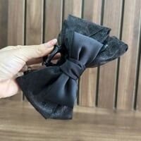 Kẹp tóc ren nơ đen chấm bi