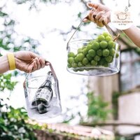 Khay nhựa hình trụ trong suốt quai da vintage đa năng