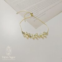 Lắc tay dây rút chất liệu titan họa tiết cánh hoa LT-009H