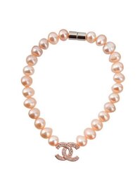 Lắc tay ngọc trai hồng chữ x