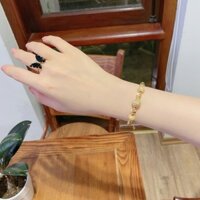 Lắc tay nữ cầu bi đá màu vàng